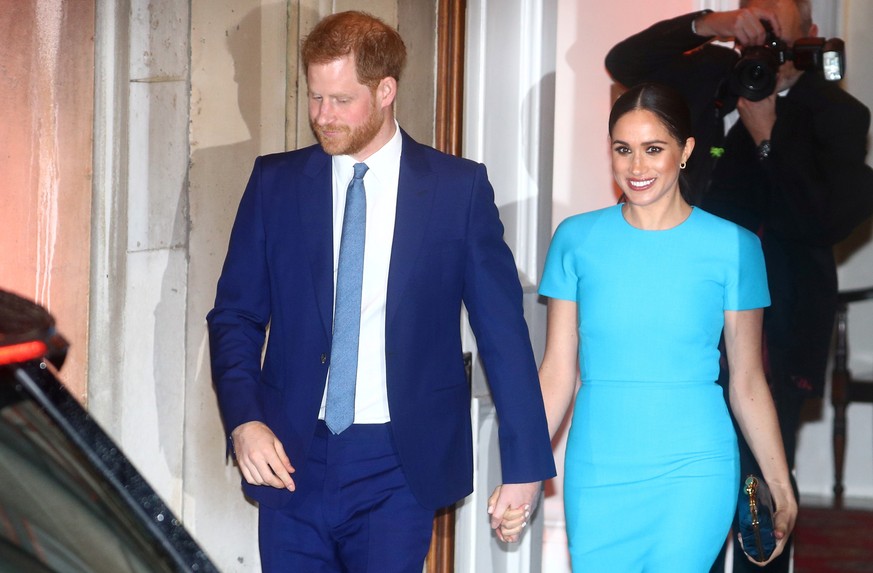 FILE PHOTO: Britain&#039;s Prince Harry and his wife, Meghan, Duchess of Sussex, leave after attending the Endeavour Fund Awards in London, Britain March 5, 2020. REUTERS/Hannah McKay/File Photo