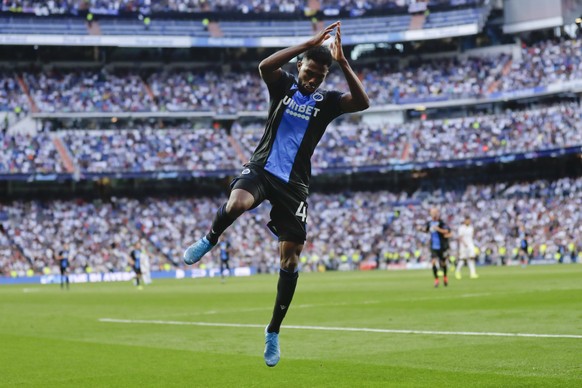 Brugge&#039;s Emmanuel Dennis celebrates after scoring his side&#039;s second goal during the Champions League group A soccer match between Real Madrid and Club Brugge, at the Santiago Bernabeu stadiu ...