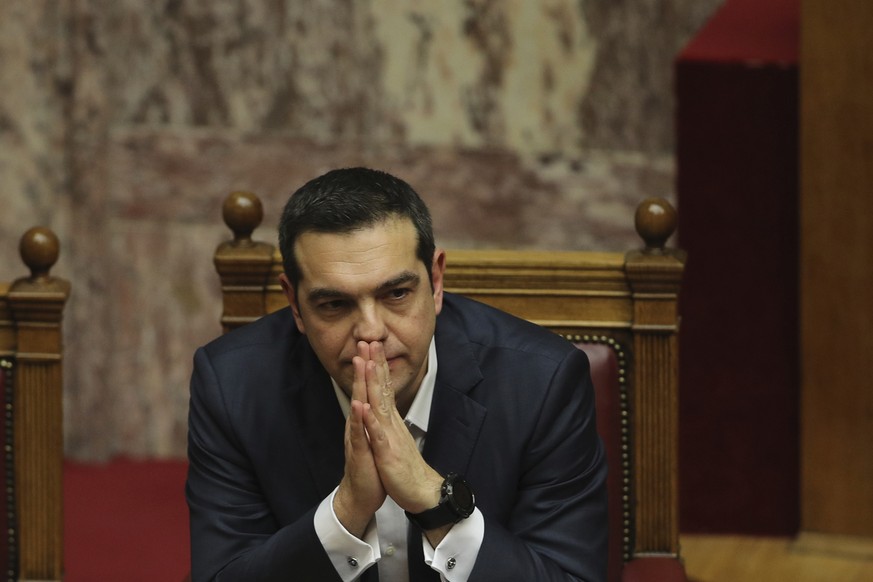 Greek Prime Minister Alexis Tsipras, attends a parliamentary session in Athens, on Wednesday, Jan. 16, 2019. Greek lawmakers geared up Wednesday night for a confidence vote in the left-wing government ...