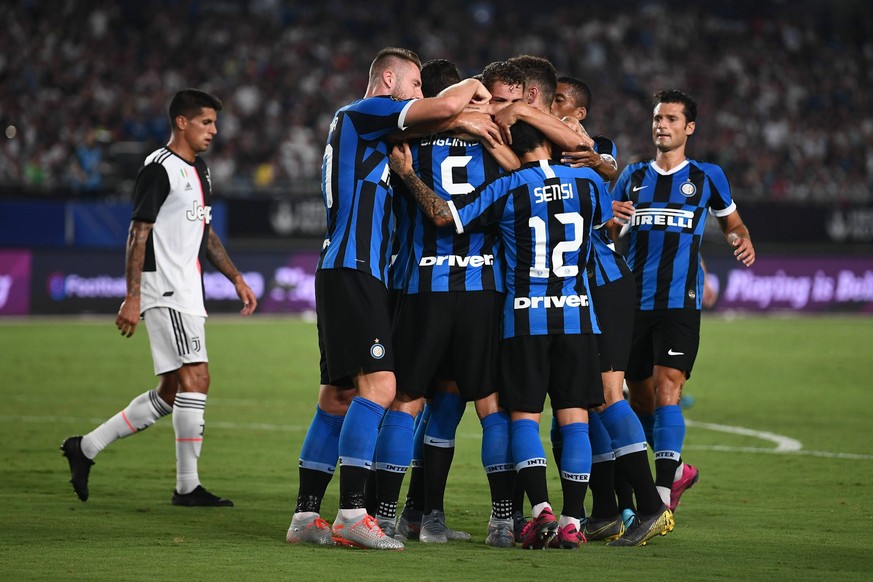 Players of Inter Milan celebrate after scoring against Juventus F.C. during the 2019 International Champions Cup football tournament in Nanjing city, east China s Jiangsu province, 24 July 2019. Juven ...