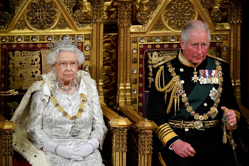 Britain s Queen Elizabeth and Charles, the Prince of Wales are seen ahead the Queen s Speech during the State Opening of Parliament in London Britain s Queen Elizabeth and Charles, the Prince of Wales ...