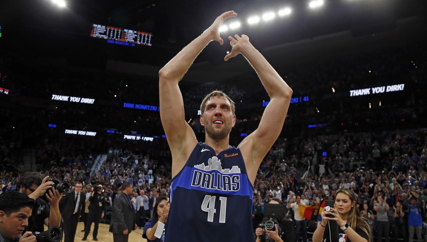 SAN ANTONIO, TX - APRIL 10: Dirk Nowitzki #41 of the Dallas Mavericks acknowledges fans at the end of his last game against the San Antonio Spurs at AT&amp;T Center on April 10, 2019 in San Antonio, T ...
