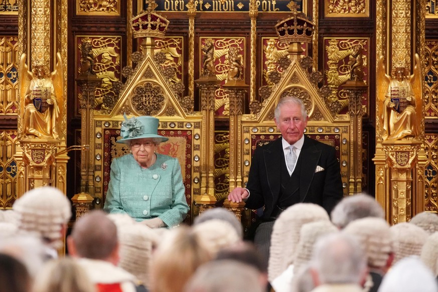 State Opening of Parliament in London Britain s Queen Elizabeth sits on the Sovereign s Throne next to Prince Charles before reading the Queen s Speech during the State Opening of Parliament at the Ho ...