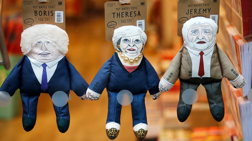 Toys for dogs themed on Britain&#039;s Prime Minister Theresa May, former Foreign Secretary Boris Johnson and leader of the Labour Party Jeremy Corbyn are displayed for sale in the window of a pet sho ...