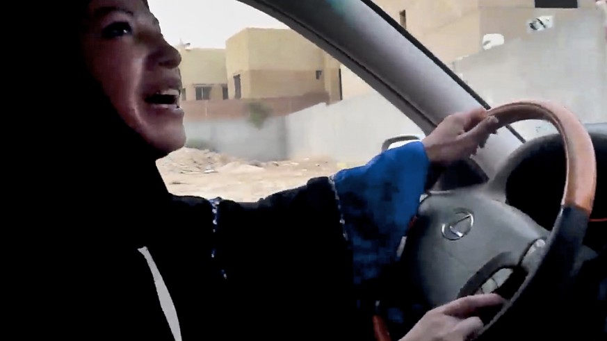 FILE - In this Friday, June 17, 2011 file image made from video released by Change.org, a Saudi Arabian woman drives a car as part of a campaign to defy Saudi Arabia&#039;s ban on women driving, in Ri ...