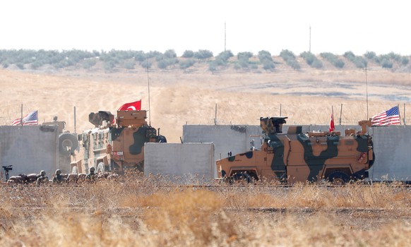 Turkish army vehicles cross into Syria for a joint U.S.-Turkey patrol, near the Turkish town of Akcakale, Turkey, September 8, 2019. REUTERS/Murad Sezer
