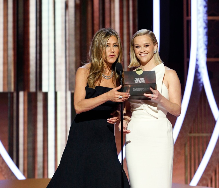 77th Golden Globe Awards - Show - Beverly Hills, California, U.S., January 5, 2020 - Jennifer Aniston (L) and Reese Witherspoon. Paul Drinkwater/NBCUniversal/Handout via REUTERS For editorial use only ...