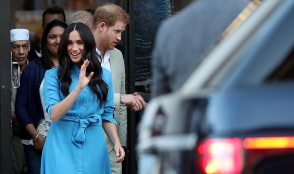 Britain&#039;s Prince Harry and Meghan, Duchess of Sussex, leave the District Six Homecoming Centre on the first day of their African tour in Cape Town, South Africa September 23, 2019. REUTERS/Sumaya ...