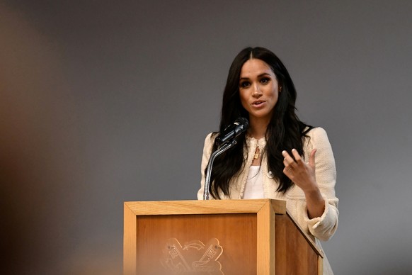 FILE PHOTO: Britain&#039;s Meghan, Duchess of Sussex speaks during a school assembly as part of a visit to Robert Clack School in Essex, Britain March 6, 2020, in support of International Women&#039;s ...