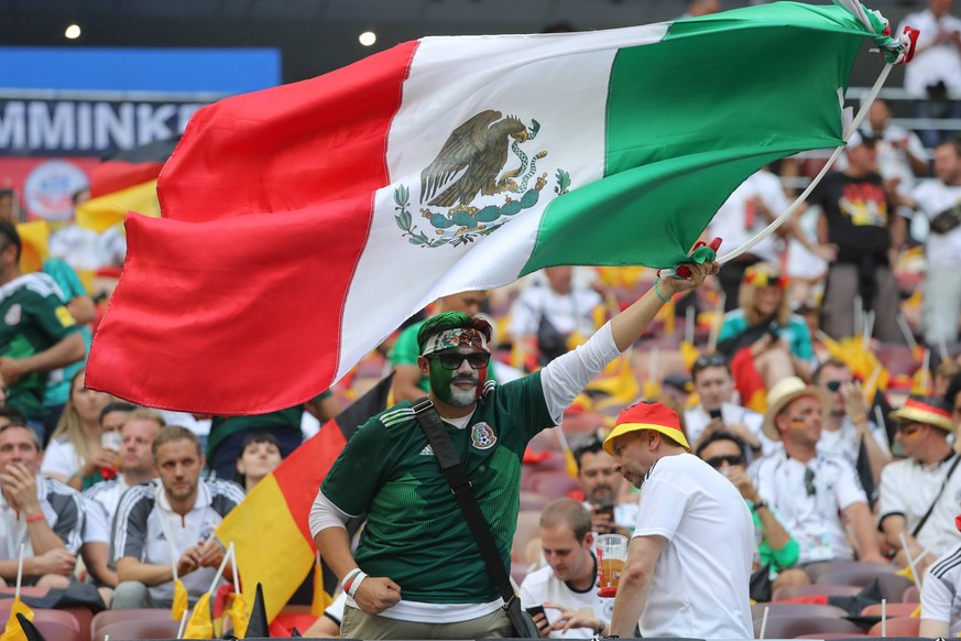 KAZAN, RUSSIA - JUNE 17: A Mexico fan waves the Mexican flag during a Group F 2018 FIFA World Cup WM Weltmeisterschaft Fussball soccer match between Germany and Mexico on June 17, 2018, at the Kazan A ...
