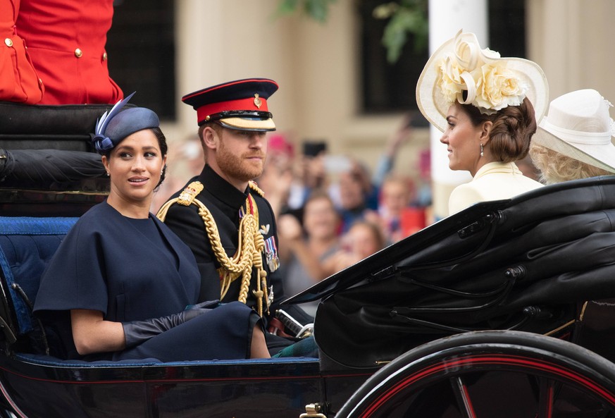Trooping the Colour Meghan, Duchess of Sussex rides in an open carriage with Prince Harry, Duke of Sussex and Catherine, Duchess of Cambridge during Trooping the Colour in London on June 08, 2019. Thi ...