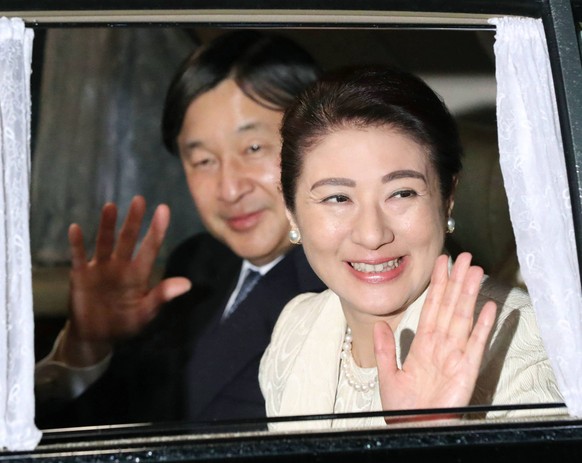 60th wedding anniversary of Japan emperor, empress Japanese Crown Prince Naruhito and Crown Princess Masako arrive at the Imperial Palace in Tokyo on April 10, 2019, to attend a dinner party celebrati ...