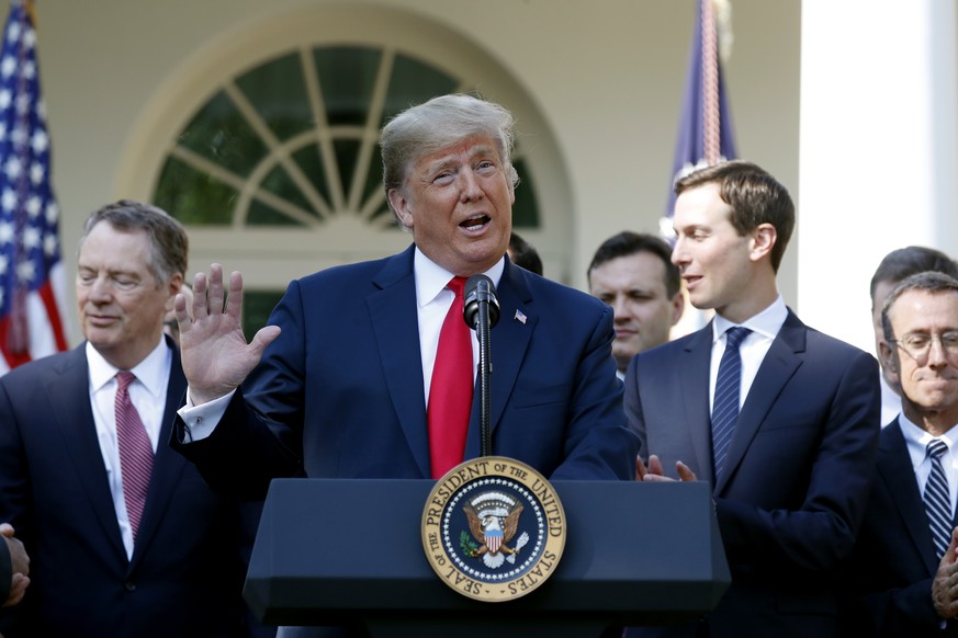 President Donald Trump speaks as he announces a revamped North American free trade deal, in the Rose Garden of the White House in Washington, Monday, Oct. 1, 2018. The new deal, reached just before a  ...