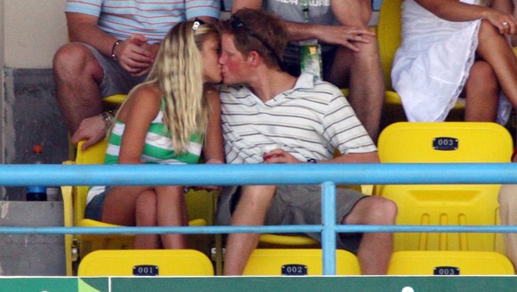 ST JOHN&#039;S, ANTIGUA AND BARBUDA - APRIL 08: IL 08: Prince Harry kisses girlfriend Chelsy Davy as they watch the action during the ICC Cricket World Cup 2007 Super Eight match between England and A ...