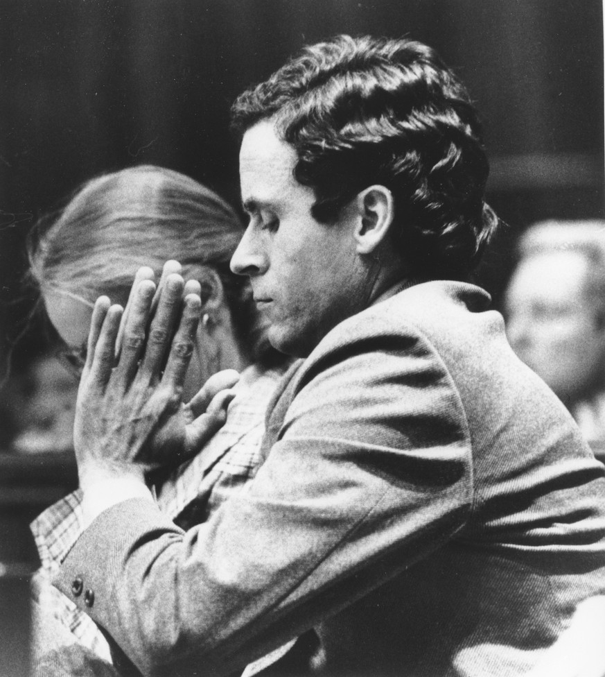 Ted Bundy presses his palms together as judge Edward C. Cowart reads the verdict of the jury of the Theodore Bundy double murder trial in the Dade County courtroom in Miami, Fla., on July 30, 1979. Th ...