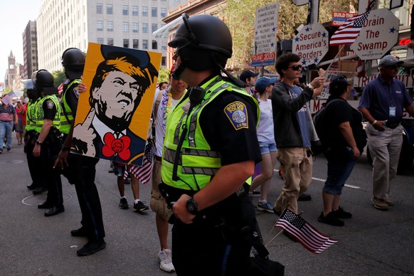 Police protect the Straight Pride Parade in Boston, Massachusetts, U.S., August 31, 2019. REUTERS/Brian Snyder