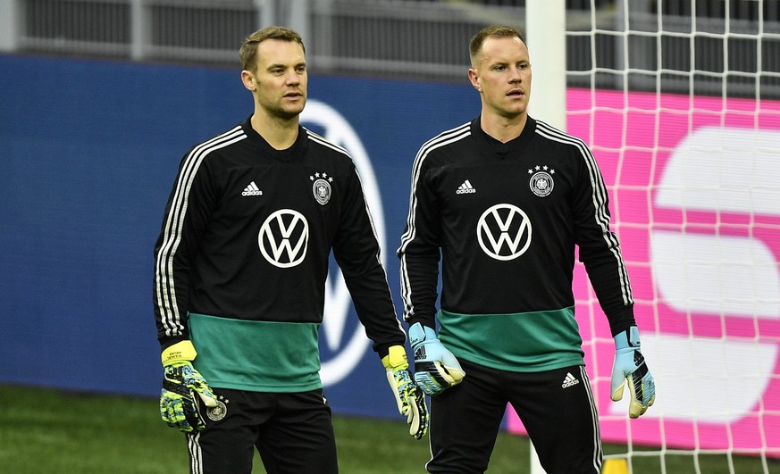 Germany&#039;s goalkeepers Marc-Andre ter Stegen, right, and Manuel Neuer exercise during a training session of the national team on Tuesday, Oct. 8, 2019, prior a friendly soccer match between German ...