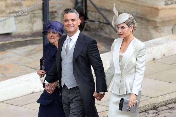 Robbie Williams and Ayda Field arrive for the wedding of Princess Eugenie to Jack Brooksbank at St George&#039;s Chapel in Windsor Castle, Windsor, Britain, October 12, 2018. Aaron Chown/Pool via REUT ...