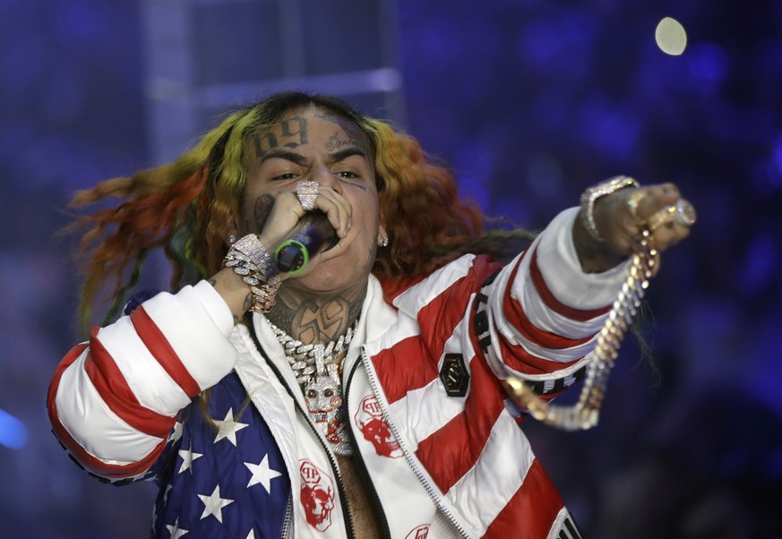 FILE- In this Sept. 21, 2018 file photo, rapper Daniel Hernandez, known as Tekashi 6ix9ine, performs during the Philipp Plein women&#039;s 2019 Spring-Summer collection during Fashion Week in Milan, I ...