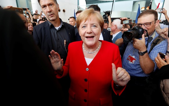 German Chancellor Angela Merkel arrives for the government&#039;s &quot;Open Door Day&quot; in Berlin, Germany, August 18, 2019. REUTERS/Fabrizio Bensch