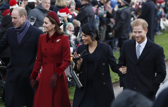 FILE - In this Tuesday, Dec. 25, 2018 file photo, Britain&#039;s Prince William, left, Kate, Duchess of Cambridge, second left, Meghan Duchess of Sussex and Prince Harry, right, arrive to attend the C ...
