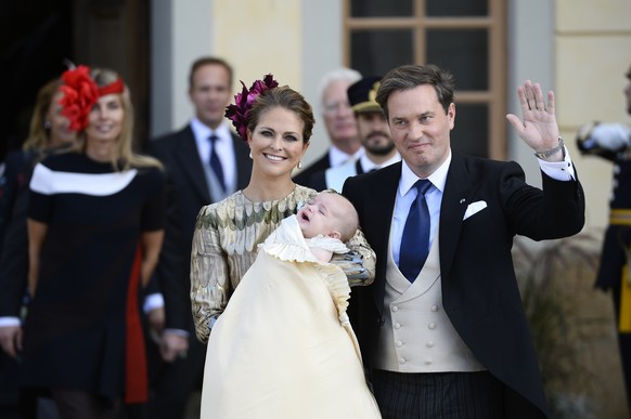 FILE - In this Sunday, Oct. 11, 2015 file photo, Sweden&#039;s Princess Madeleine and Christopher O&#039;Neill pose with their son Prince Nicolas after his baptism ceremony, at the Drottningholm Palac ...